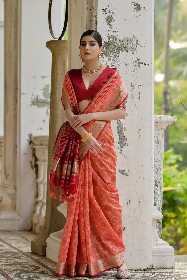 Orange_Raw_Silk_Saree_With_Blouse_Piece_For_Women