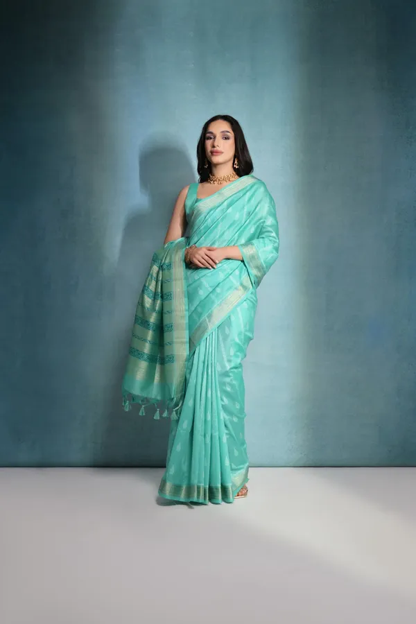 Sea_Green_Raw_Silk_Saree_With_Blouse_Piece_For_Women
