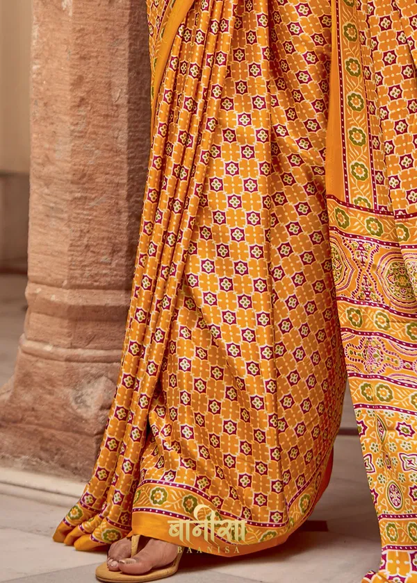 Orangish_Yellow_Ajrakh_Printed_Satin_Crepe_Saree_With_Matched_Unsttiched_Blouse