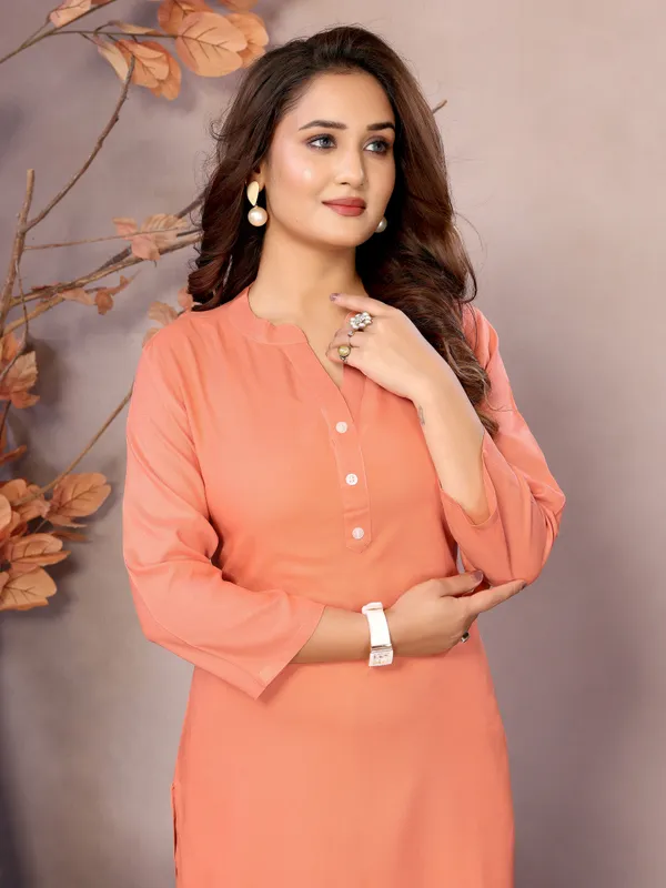 Peach_Pure_Viscose_Mandarin_V-Neck_Neck_Long_Knee_Length_3/4_Sleeve_Kurti_For_Women