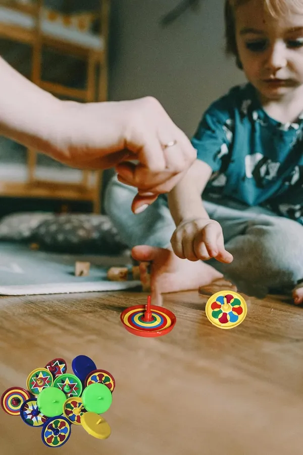 ‎Multicolor_Plastic_Spinning_Top_Toys_For_Kids_(Pack_Of_12)_(50_X_50_X_30_Mm)