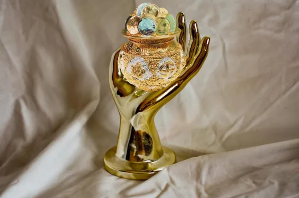 Golden,_Silver_Metal_Swastik_Embossed_Varalakshmi_Potli_Puja_Item_(12_X_8_X_2_Cm)