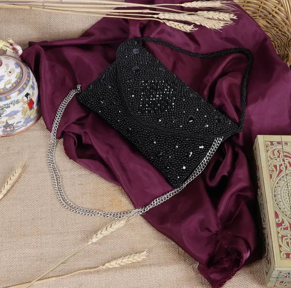 Osty_Aurelia_–_Handcrafted_Diamond_Zari_Clutch_with_Dual_Handle
