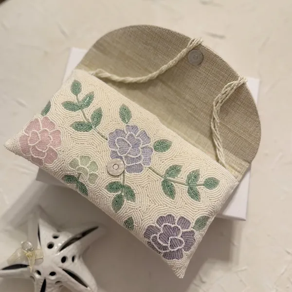 Osty_Lush_–_Floral_Hand_Zari_Beaded_Clutch_with_Dual_Handle_|_Ivory_Base_Pastel_Embroidery_Bag