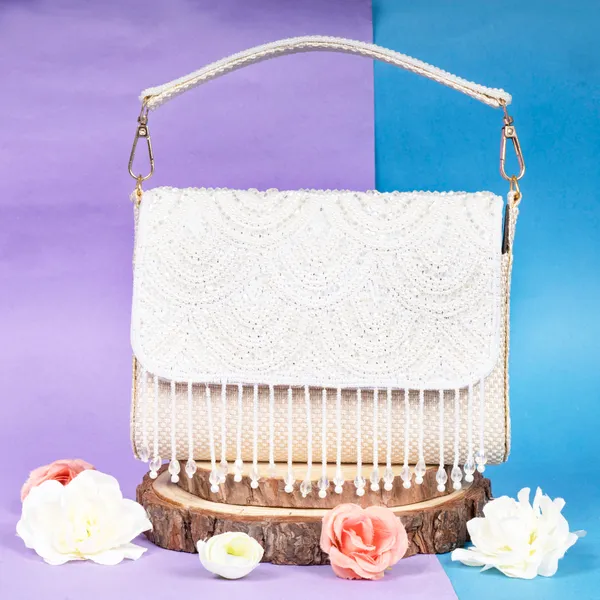 OSTY_VELMI_Bridal_Clutch_with_Pearl_Arch_Embroidery,_Beaded_Tassels_&_Dual_Handle_Option_|_Jute_Back_Finish