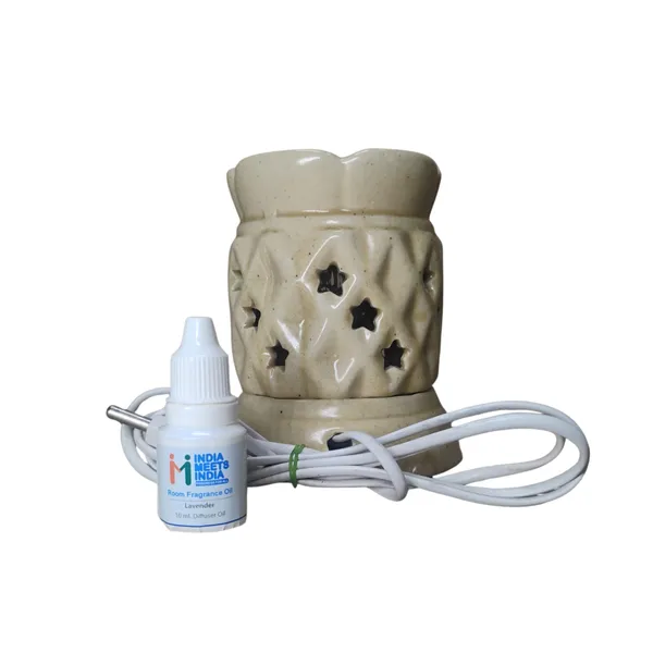 Ceramic_Electric_Aroma_Oil_Diffuser_with_Star_Cut_Design_–_Includes_10ml_Lavender_Fragrance_Oil