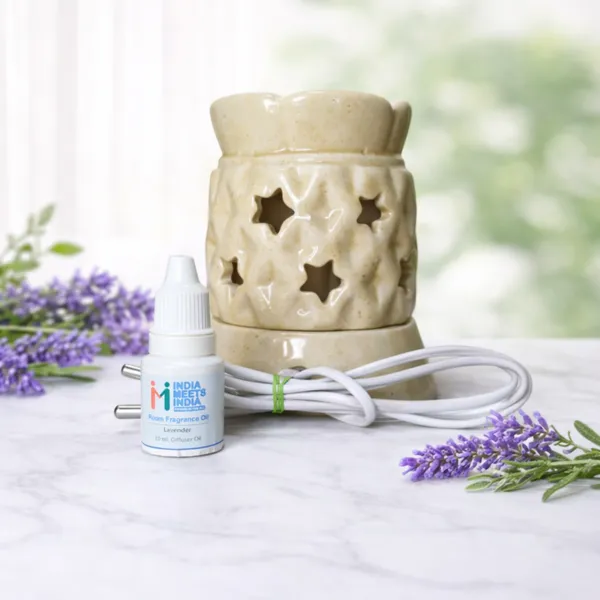 Ceramic_Electric_Aroma_Oil_Diffuser_with_Star_Cut_Design_–_Includes_10ml_Lavender_Fragrance_Oil