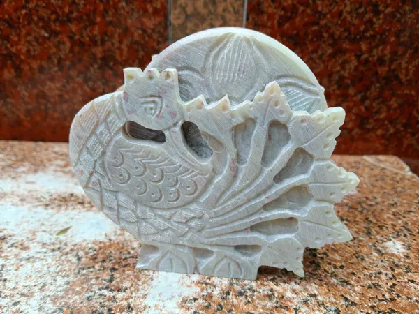 Soapstone_coaster_set_in_Peacock_Face_Design