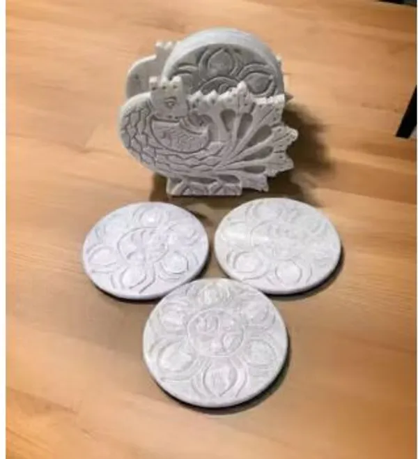 Soapstone_coaster_set_in_Peacock_Face_Design