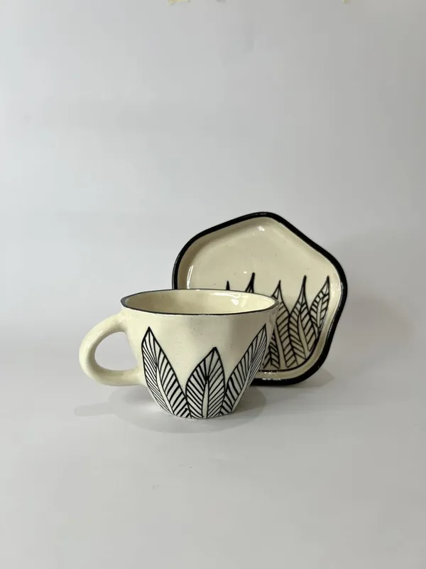 Tranquil_Leaves_Ceramic_Cup_and_Saucer_Set_with_Black_Leaf_Pattern_Design