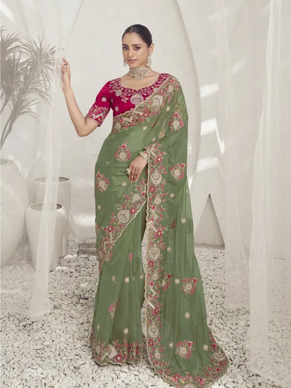 Green_Raw_Silk_Embellished_Bollywood_Saree_With_Unstitched_Blouse_For_Women