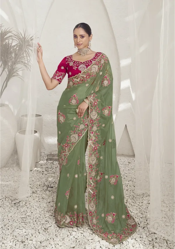 Green_Raw_Silk_Embellished_Bollywood_Saree_With_Unstitched_Blouse_For_Women
