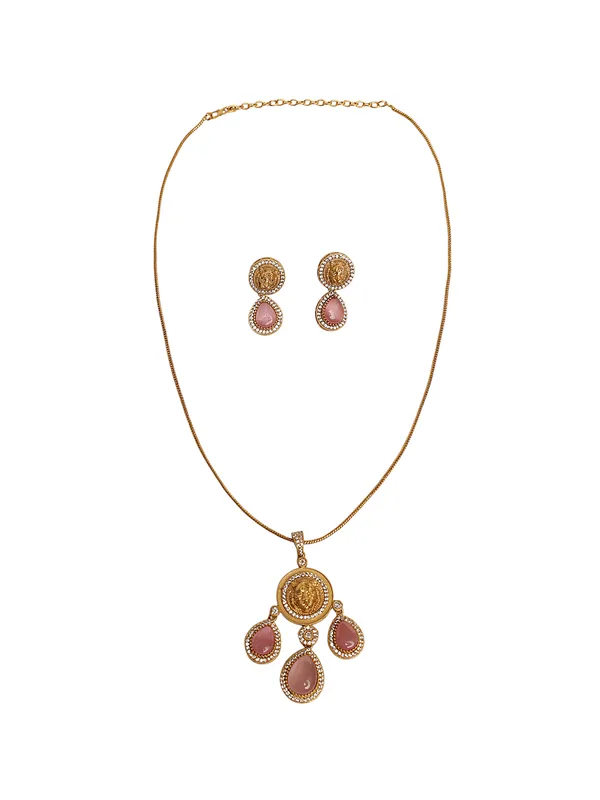 Stunning_Gold_Plated_Pendant_Set._The_top_charm_mirrors_the_gold_coin-like_emblem_With_Pink_stone.These_earrings_have_a_royal,_statement_appeal,_suitable_for_festive_or_formal_occasions.