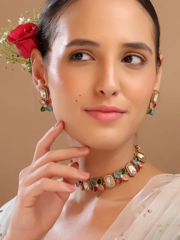 Beautiful_Multi_coloured_Necklace_set._This_gold_plated_necklace_and_earrings_set_features_vibrant_multicolor_stones_that_add_a_lively_and_elegant_touch_to_any_outfit._Designed_to_complement_both_traditional_and_modern_styles,_it_is_perfect_for_celebrations_and_special_occasions.