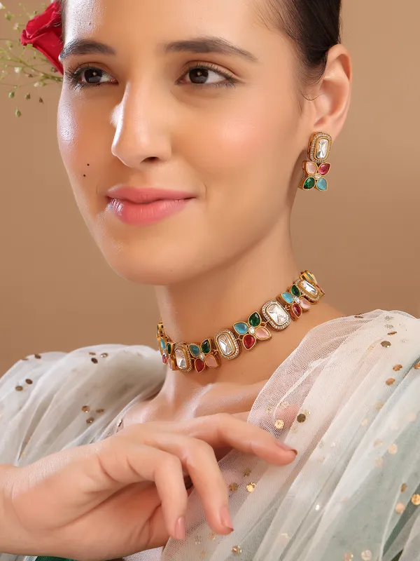 Beautiful_Multi_coloured_Necklace_set._This_gold_plated_necklace_and_earrings_set_features_vibrant_multicolor_stones_that_add_a_lively_and_elegant_touch_to_any_outfit._Designed_to_complement_both_traditional_and_modern_styles,_it_is_perfect_for_celebrations_and_special_occasions.