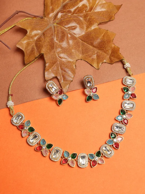 Beautiful_Multi_coloured_Necklace_set._This_gold_plated_necklace_and_earrings_set_features_vibrant_multicolor_stones_that_add_a_lively_and_elegant_touch_to_any_outfit._Designed_to_complement_both_traditional_and_modern_styles,_it_is_perfect_for_celebrations_and_special_occasions.