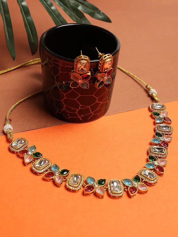 Beautiful_Multi_coloured_Necklace_set._This_gold_plated_necklace_and_earrings_set_features_vibrant_multicolor_stones_that_add_a_lively_and_elegant_touch_to_any_outfit._Designed_to_complement_both_traditional_and_modern_styles,_it_is_perfect_for_celebrations_and_special_occasions.
