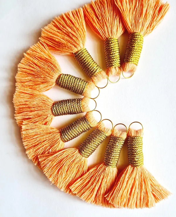 Handmade_Mini_Cotton_Tassels_with_Zari_Winding,_Pack_of_10__(Peach)