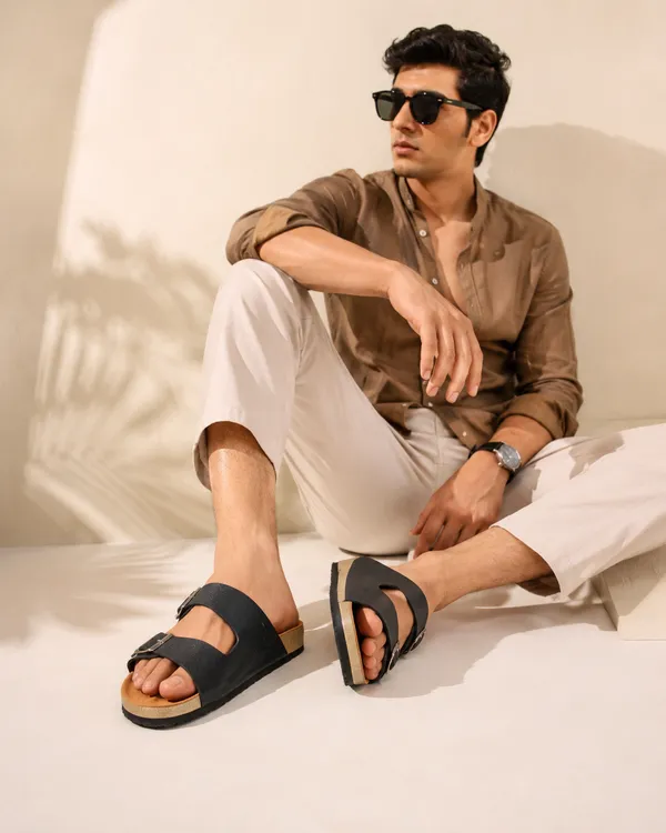 Black_slippers_with_hiqh_quality_sythetic_leather,_genuine_leatherite_cushioned_insoles_and_rubber_sole_for_a_long_lasting_effect