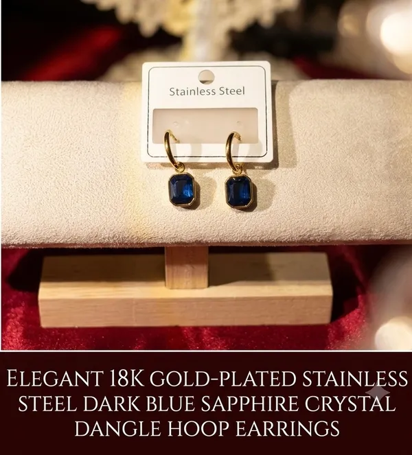 Elegant_18K_Gold-Plated_Stainless_Steel_Dark_Blue_Crystal_Dangle_Hoop_Earrings_for_Women_Key_Features_&_Highlights_Material:_Premium_Stainless_Steel_with_Gold_Plating_(Anti-tarnish,_Rust-free)_Stone:_High-shine_Emerald-cut_Dark_Blue_Gemstone_/_Sapphire_Crystal_Closure:_Secure_Latch_Back_/_Huggie_Hoop_Style:_Luxury_Vintage_&_Modern_Minimalist_Dangle_Earrings_Skin-Friendly:_Hypoallergenic,_Lead-free,_and_Nickel-free_for_sensitive_skin