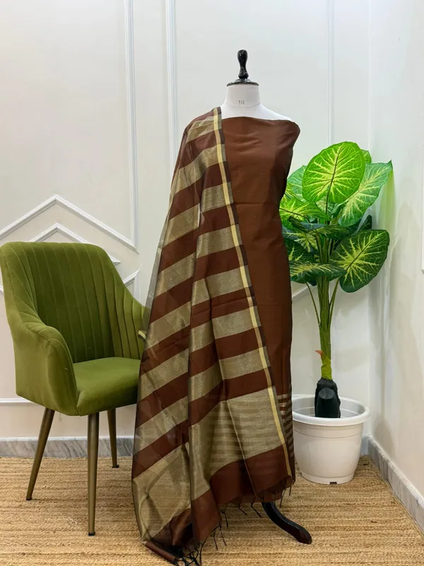 Exclusive_Banarasi_Unstitched_Salwar_kameez_with_Dupatta🦋*___*BANARASI_SUIT*cotton_silk_suit__*TOP-_cotton_silk_with_stripe_zari_patti___*DUPATTA-_cotton_silk_with_stipe_zari_cotton__*BOTTOM-*_cotton_silk_plain__*2.50_meter_each*