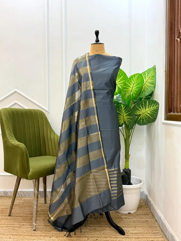 Exclusive_Banarasi_Unstitched_Salwar_kameez_with_Dupatta🦋*___*BANARASI_SUIT*cotton_silk_suit__*TOP-_cotton_silk_with_stripe_zari_patti___*DUPATTA-_cotton_silk_with_stipe_zari_cotton__*BOTTOM-*_cotton_silk_plain__*2.50_meter_each*