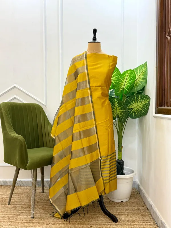 Exclusive_Banarasi_Unstitched_Salwar_kameez_with_Dupatta🦋*___*BANARASI_SUIT*cotton_silk_suit__*TOP-_cotton_silk_with_stripe_zari_patti___*DUPATTA-_cotton_silk_with_stipe_zari_cotton__*BOTTOM-*_cotton_silk_plain__*2.50_meter_each*