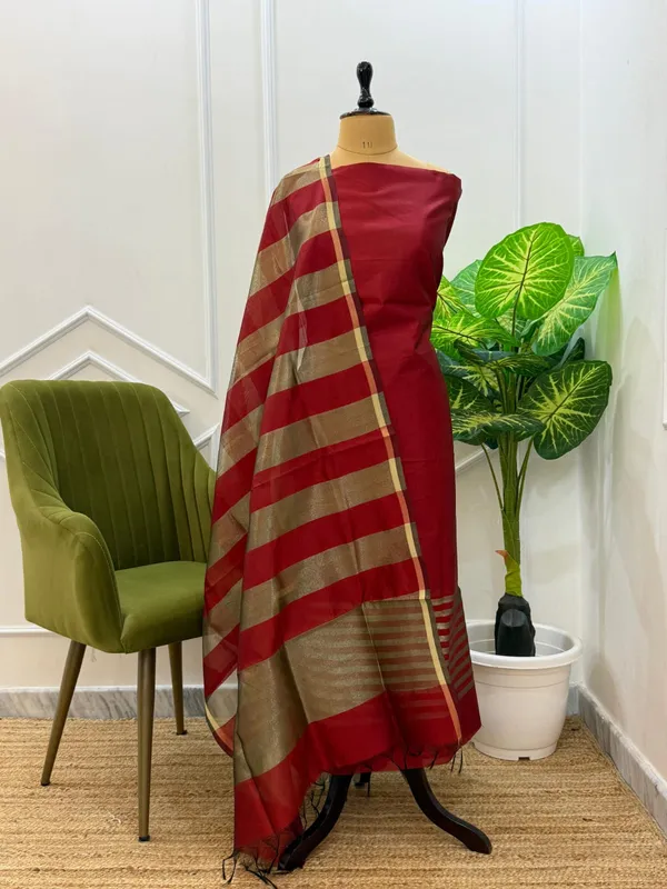 Exclusive_Banarasi_Unstitched_Salwar_kameez_with_Dupatta🦋*___*BANARASI_SUIT*cotton_silk_suit__*TOP-_cotton_silk_with_stripe_zari_patti___*DUPATTA-_cotton_silk_with_stipe_zari_cotton__*BOTTOM-*_cotton_silk_plain__*2.50_meter_each*