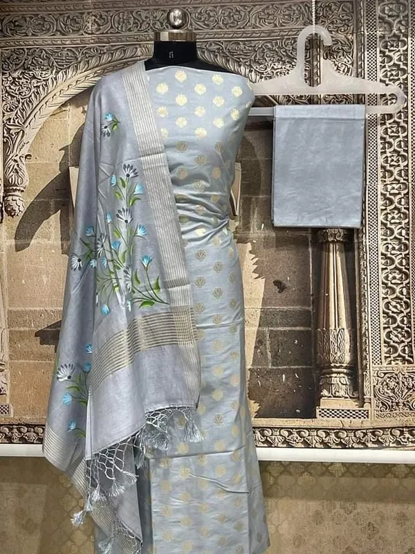 Exclusive_Banarasi_Unstitched_Salwar_kameez_with_Dupatta_BANARASI___SUIT___pure_mercerized_TOP-___pure_mercerised_zari__weaving_DUPATTA-_*_mercerised__silk__with_handbrush_flower_design_BOTTOM-___cotton_silk__dyble_plain_2.50_meter_each