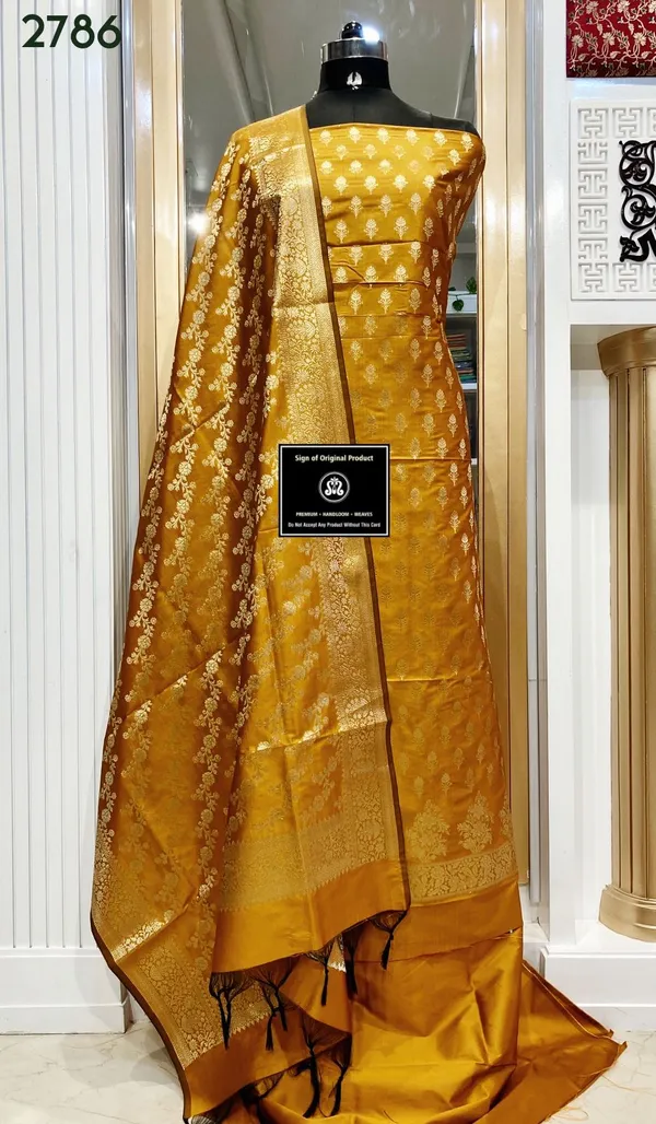 Exclusive_Banarasi_Unstitched_Salwar_kameez_with_Dupatta_BANARASI___SUIT_TOP-___silk_katan_zari_weaving_booti_daman_design_DUPATTA-__katan_silk_zari_weaving__design_Bottom.__Plain_silk_katan_2.50_meter_each