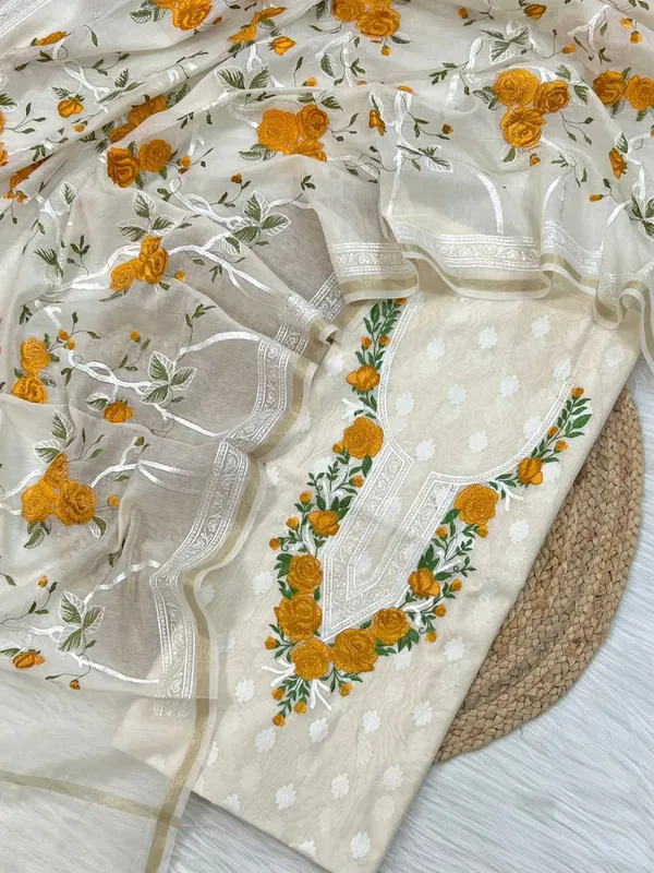 EXCLUSIVE_BANARSI_WHITE_COLLECTION_Presenting_very_beautiful,_cotton_chanderi_booti_embellished_with_multi_embroidery_neck_design_Paired_with_cotton_multi_thread_embroidery_dupatta_and_cotton_silk_plain_bottom_Each_2.50_mtr