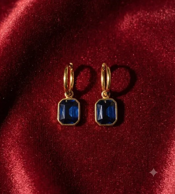 Elegant_18K_Gold-Plated_Stainless_Steel_Dark_Blue_Crystal_Dangle_Hoop_Earrings_for_Women_Key_Features_&_Highlights_Material:_Premium_Stainless_Steel_with_Gold_Plating_(Anti-tarnish,_Rust-free)_Stone:_High-shine_Emerald-cut_Dark_Blue_Gemstone_/_Sapphire_Crystal_Closure:_Secure_Latch_Back_/_Huggie_Hoop_Style:_Luxury_Vintage_&_Modern_Minimalist_Dangle_Earrings_Skin-Friendly:_Hypoallergenic,_Lead-free,_and_Nickel-free_for_sensitive_skin