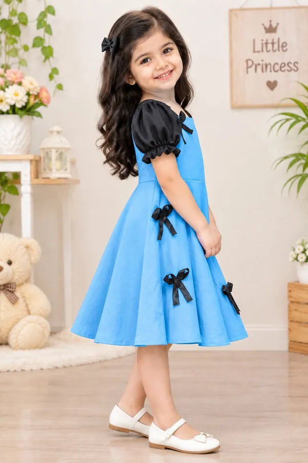 Girls_Denim_Sky_Blue_Fit_&_Flare_Frock_with_Black_Puff_Sleeves_&_Bow_|_Premium_Party_Wear_Dress