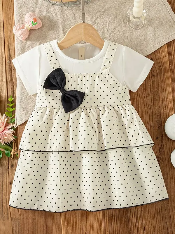 Girls_White_Polka_Dot_Layered_Frock_with_Black_Bow