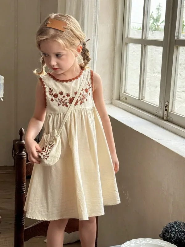 Girls_Sleeveless_Cotton_Dress_With_Embroidered_Floral_Detailing_&_Matching_Pouch