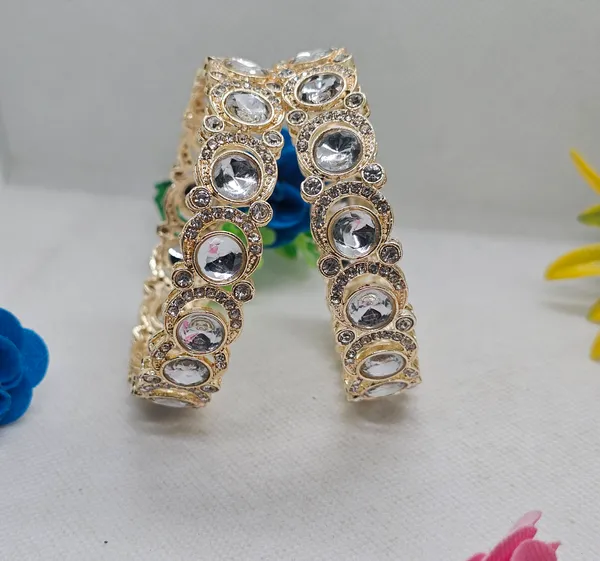 Panini Jewels Moon Style Kundan Stone Designer Bangles Set Price in India  Buy Panini Jewels Moon Style Kundan Stone Designer Bangles Set online 