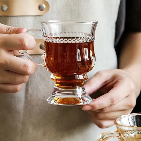 Transparent_Clear_Round_Crystal_Clear_Glass_Tea_Cup_-_145Ml_With_Convenient_Solid_Handle_Cups_Espresso_Mug_Set_For_Cappuccino_Milk_Tea_Coffee_Hot-Cold_Drinks_(Pack_Of_2)