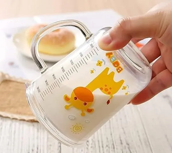 Transparent_Clear_Glass_Mug_With_Silicone_Straw_And_Lid_Measuring_Scale_Drinking_Cup_For_Kids_&_Adults_Perfect_For_Milk_Juice_Coffee_Random_Cartoon_Printed_-_300Ml