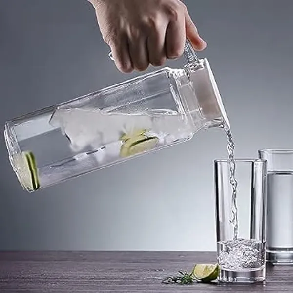 Transparent_Clear_Premium_Water_Jug_With_Plastic_Lid_&_Handle_1.1L_Beverage_Carafe_For_Home_Office_Pitcher_For_Serve_Water_Milk_Juice_Beverage_Chaas_Cocktail_(Octa_Jug_1.1_Ltr)