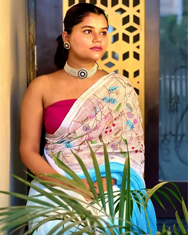Bhavbheeni_White_&_Light_Blue_Embroidered_Saree