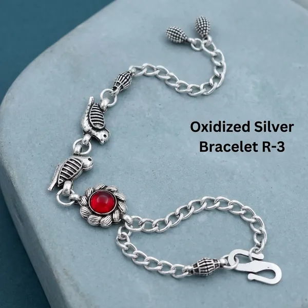 Silver_Oxidized_Alloy_Red_Stone_Bird_Charm_Bracelet_For_Women
