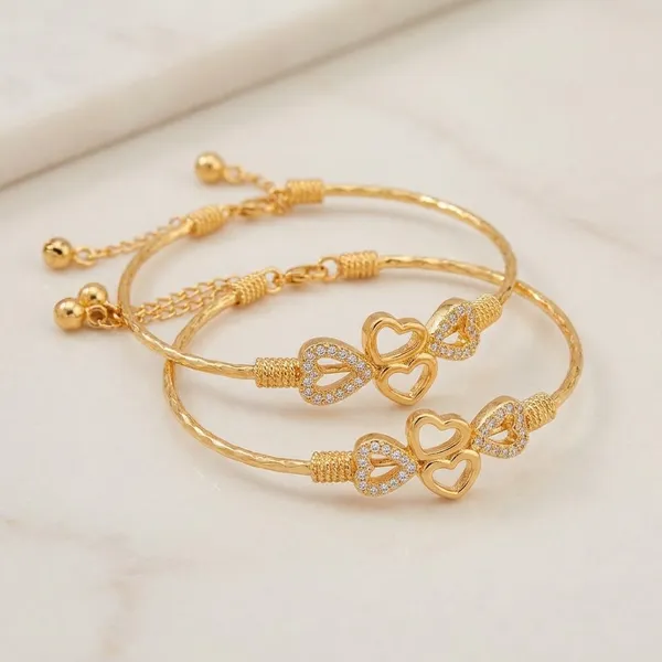 Gold_Alloy_Heart_Design_Adjustable_Bracelet_For_Women