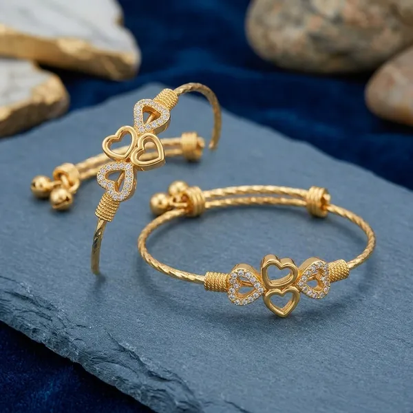 Gold_Alloy_Heart_Design_Adjustable_Bracelet_For_Women