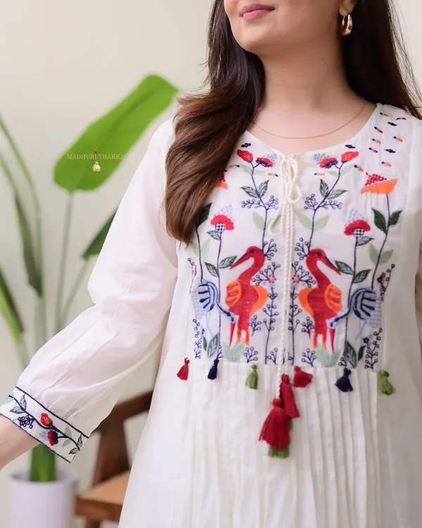 Stylish_pure_cotton_embroidered_kurta_set_with_chic_pleating_and_handcrafted_yoke_detailing