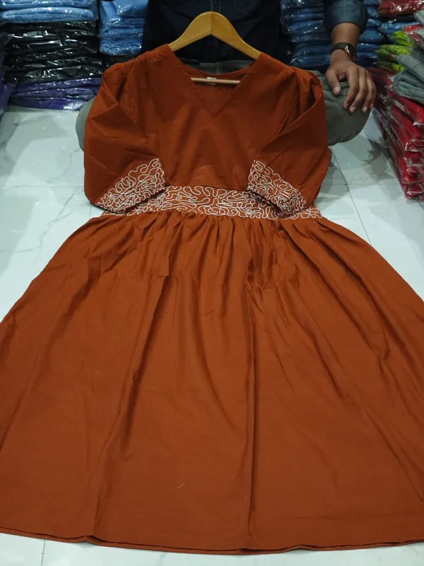 Classy_cotton_gown_dress_with_embroidered_detailing_and_graceful_summer_silhouette