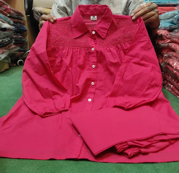 Hot_Pink_cotton_co-ord_set_with_intricate_embroidery_detailing_and_contemporary_comfort