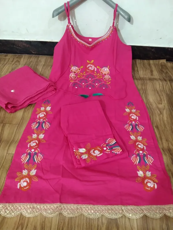 Stylish_cotton_embroidered_sleeveless_kurti_set_with_chic_festive_detailing