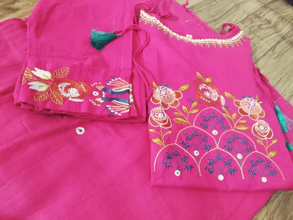 Stylish_cotton_embroidered_sleeveless_kurti_set_with_chic_festive_detailing