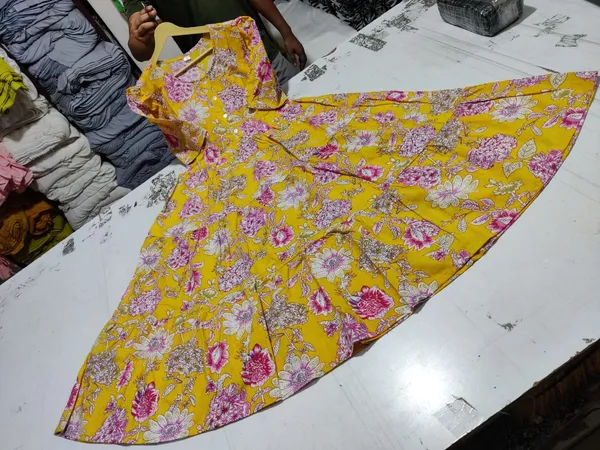 Beautiful_Yellow_Cotton_Midi_Kurti_with_Floral_Print_and_Puff_Sleeves