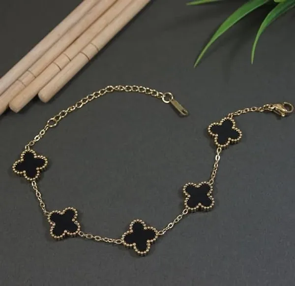 JWELLA_Gold_Plated_Black_Clover_Wrist_Bracelet_for_Women_|_Hand_Band_for_Girls_|_Fancy_&_Stylish_Womens_Accessories_Bracelets_for_Woman,_Girlfriend_&_Wife